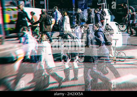 Multiple exposures of Commuters on their way to work, Waterloo Station, Cross processed colours Stock Photo