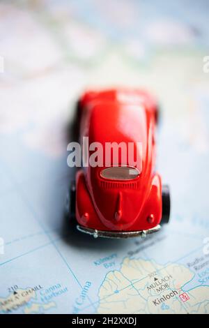 Toy car on a road map Stock Photo