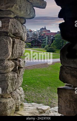 The entrance to Mohonk Mountain House, from the view of a stone gazebo, in upstate New York.