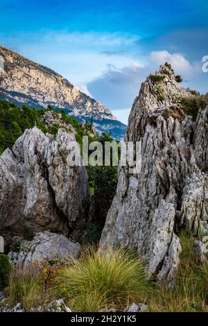 Way down from mountain in between two cliffs Stock Photo