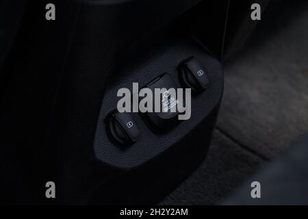 12V and 220v power outlet socket in the car. Closed sockets. Stock Photo