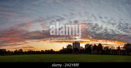 A mackeral sky over tower blocks in Wandsworth, London at sunset Stock Photo