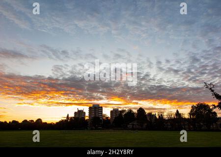A mackeral sky over tower blocks in Wandsworth, London at sunset Stock Photo