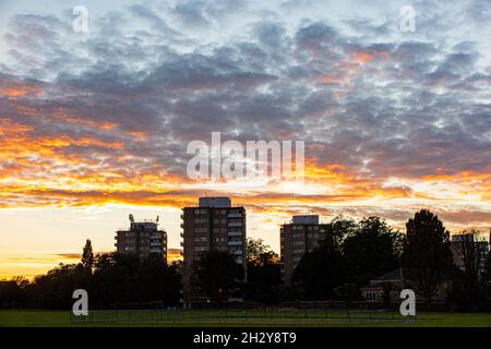 A mackeral sky over tower blocks in Wandsworth, London at sunset Stock Photo