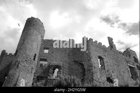 The majestic ruins of Laugharne Castle in the coastal town of Laugharne in Carmarthenshire, Wales Stock Photo