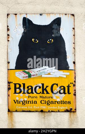 Black Cat Cigarette Sign Stock Photo