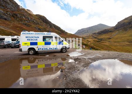 Police and Glencoe Mountain Rescue vehicles at Three Sisters Viewpoint, Glen Coe, Scottish Highlands, Scotland, UK Stock Photo