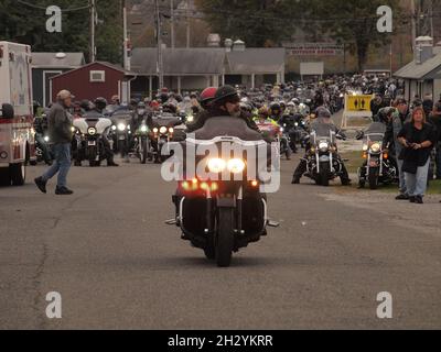 Motorcycle rally in Sussex County New Jersey shows hundreds leaving on a police escorted run through the area. Fundraiser for injured and fallen. Stock Photo