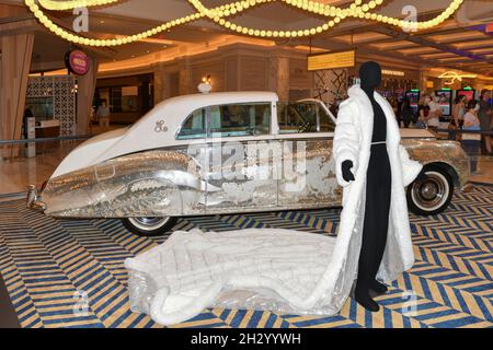 Nevada USA 09-05-21 A long white robe and a Rolls-Royce Phantom Limousine by the famous pianist Liberace is on display at Resorts World Las Vegas Stock Photo