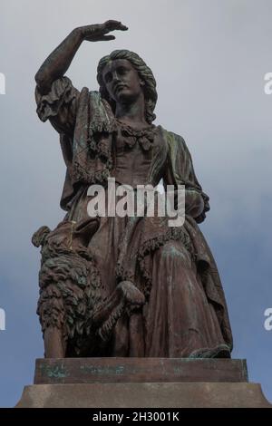 Statue to Flora MacDonald with her collie dog outside Inverness Castle, Inverness, Scotland UK Stock Photo