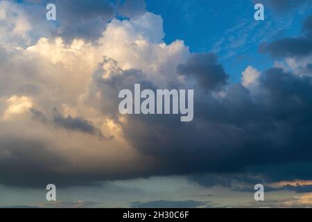 Dramatic of sunset and dark clouds, Colorful of sunrise, Cityscape of sunset time Stock Photo