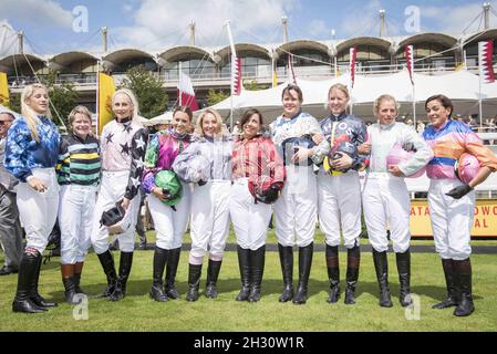 Racers in the Magnolia Cup, Ladies race photocall on Ladies Day, Day 3 of the Qatar Glorious Goodwood Festival - Chichester Stock Photo