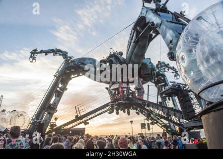 General view of the sun setting behind the Arcadia spider on day 4 of Glastonbury festival 2015, Worthy Farm, Somerset Stock Photo