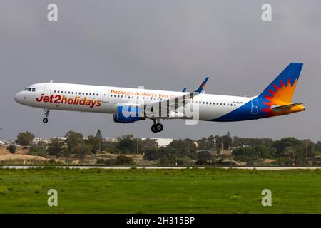 Jet2 Holidays Airbus A321-211 (REG: G-HLYF) replacing the more common A320 flights from Manchester, UK. Stock Photo
