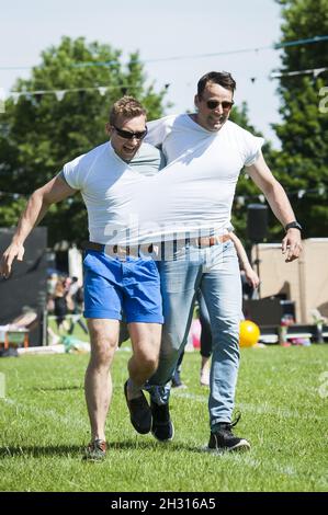 Festival goers take part in Sports day events at Field Day Festival 2017, Victoria Park, London. Picture date: Saturday 3rd June 2017. Photo credit: Â© DavidJensen/EMPICS Entertainment Stock Photo