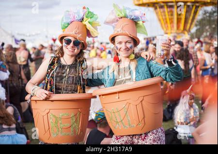 Festival goers dress as Bill and Ben the flower pot men at Shambala 2017, Kelmarsh Hall, Kelmarsh - Northampton. Picture date: 26th August 2017. Photo credit should read: David Jensen/EMPICS Entertainment Stock Photo