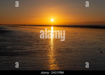 Autumn sunrise on Littlehampton beach Stock Photo