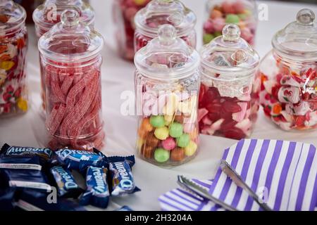 Party table snacks sweets in a jar Stock Photo