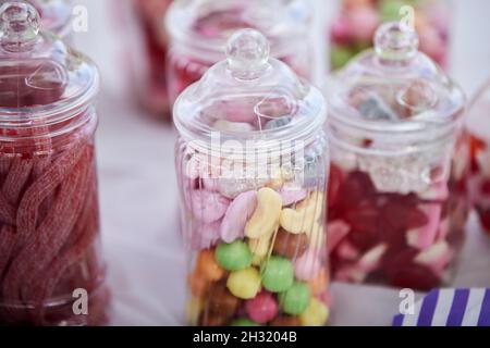Party table snacks sweets in a jar Stock Photo