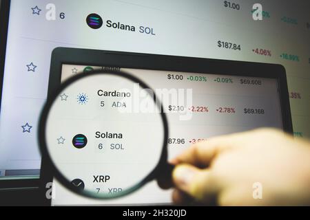 Solana cryptocurrency on market. Solana is a public blockchain platform. It is open-source and decentralized, with consensus achieved using proof of s Stock Photo