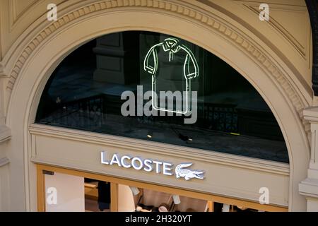 Moscow, Russia - October 14, 2021: Signboard of lacoste  store. Lacoste  boutique in GUM Stock Photo