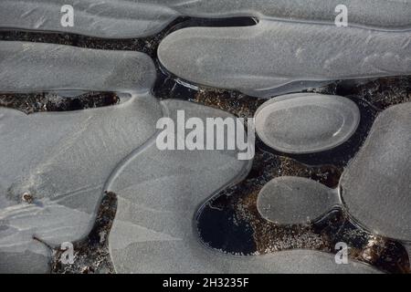 Air Trapped In Thin Layer Of Ice. Stock Photo