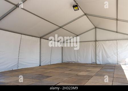 Large white wedding or entertainment event tent interior view Stock Photo