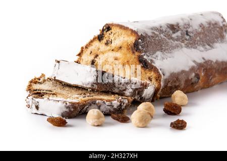 Christmas stollen. Traditional German Christmas dessert isolated on white background Stock Photo