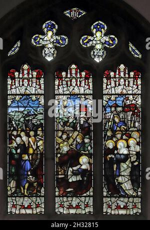 A stained glass window by the Kempe Studio. depicting Christ carrying the cross, King's Cliffe Church, Northamptonshire Stock Photo