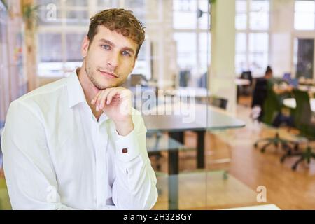 Thoughtful student or business start-up founder in the office Stock Photo