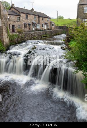 Waterfall on Gayle Beck in the centre of Hawes, Wensleydale Stock Photo