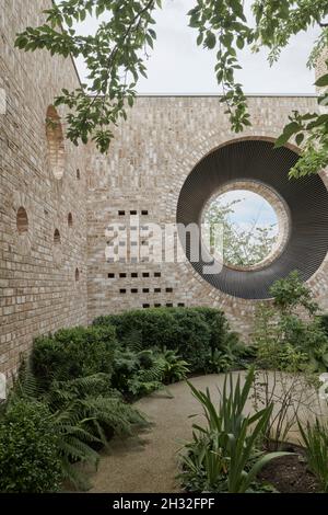 Courtyard of the Storey's Field Community Centre in Eddington Cambridge. Designed by McInnes Usher McKnight Architects 2018 Stock Photo