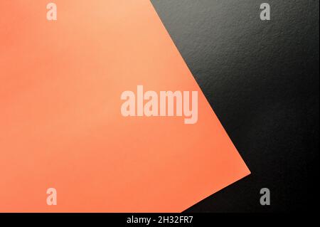Geometry textured paper background; minimal concept. Orange and black colors. Abstract and creative flat layout with copy space. Stock Photo