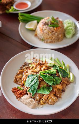 Stir fried wide rice noodles and pork with black soy sauce (Pad See Ew) Stock Photo
