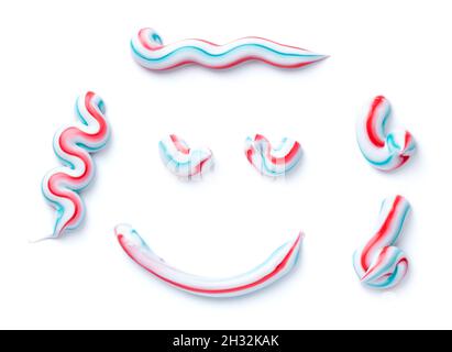 Set of striped toothpaste isolated on white background. Top view Stock Photo