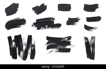 Black paint strokes isolated on white background Stock Photo