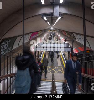 Clapham Common tube /subway station on the Northern Line, London Underground. Trains in the station, passengers on the platform, elevated view. Stock Photo