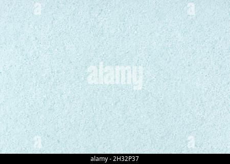 Turquoise colored sand background texture. Full frame Stock Photo