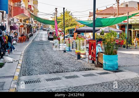 Urla, Turkey - September, 2021: Street, shops, cafes and people in Urla town in İzmir, Turkey. Stock Photo