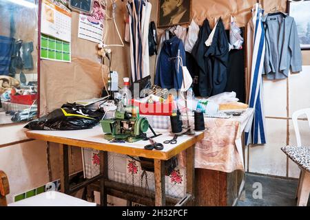 Urla, Turkey - September, 2021: Vintage tailor shop interior. The oldest historical tailor shop in Urla Izmir Turkey. Stock Photo