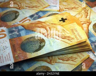 Money of Switzerland. Swiss franc bills. CHF banknotes. 10 francs. Business, finance, news background. 3d illustration. Stock Photo
