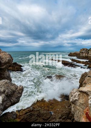 View on a cloudy day toward Sievers Point from the Cliff Path. Hermanus. Whale Coast. Overberg. Western Cape. South Africa Stock Photo