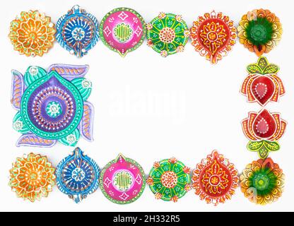 Various Multicolor Diya, Deep Or Dia Arranged As Border And Frame. White Background With Space For Custom Text. Theme For Diwali, Navratri Pooja, Duss Stock Photo