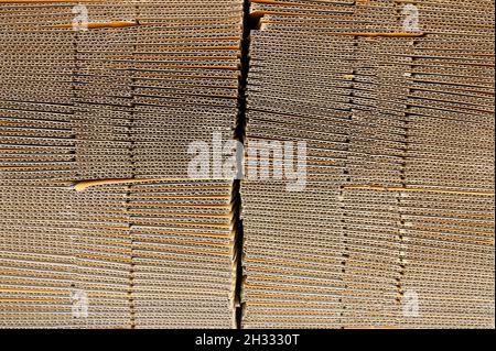 Brown craft paper corrugated rough texture stacked background Stock Photo