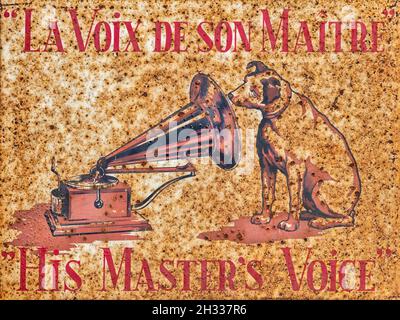 Den Bosch, The Netherlands - May 12, 2019: Heavily rusted steel advertising placard of music company His Masters Voice in Den Bosch, The Netherlands Stock Photo