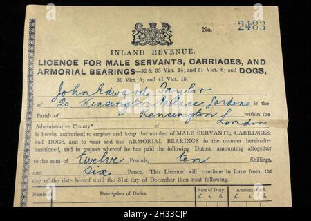 Replica copy of a Victorian era Inland Revenue Notice Licence for servants and carriages (1899) Stock Photo