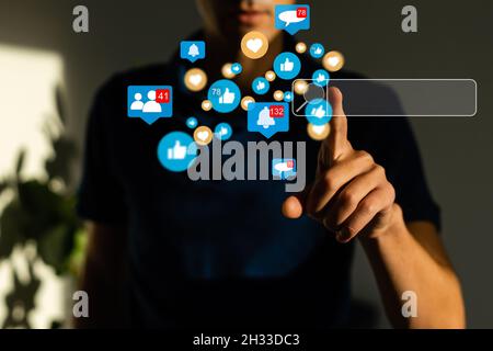Business woman pointing her fingers on virtual web interface icons Stock Photo