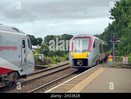 Greater Anglia Class 755 bi-mode trains cross at North Walsham station on the Bittern Line (Norwich - Sheringham) in North Norfolk. Stock Photo