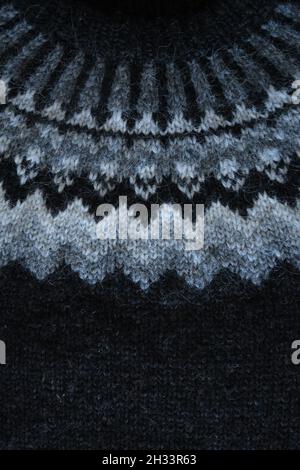 Traditional Icelandic wool sweater, called a lopapeysa. Close up of the knitted texture and pattern. Stock Photo