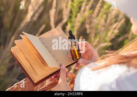 Natural herbal medicine in a dropper bottle - MOCKUP, blank page. Concept image. Stock Photo